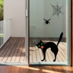 fekete macska pókhálóval falmatrica